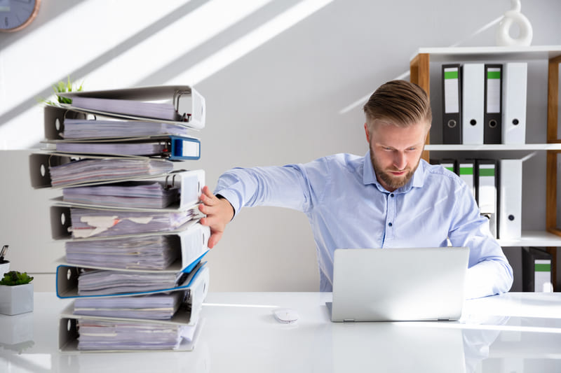 A tax specialist doing tax work on a computer